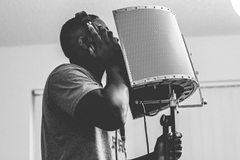 man-recording-voice-over-for-e-learning
