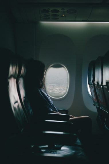voice overs for pram - lady watching over from plane window