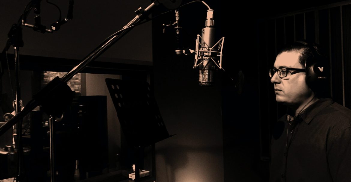 5 Questions to Ask a Professional Voice Actor Before Recording - voice actor in studio