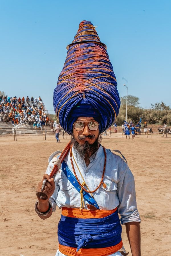 Punjabi voice actors - man holds sword in Punjab India