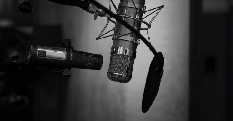 Things to Do When Seeking a Professional Voice Over - Two studio microphones