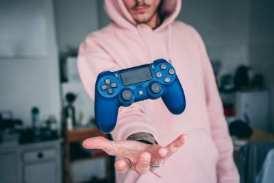How to Hire Video Game Voice Actors - Gamer catches ps4 controller