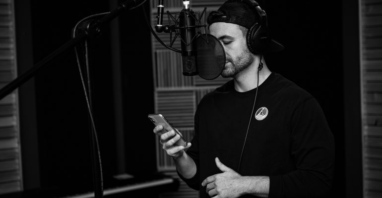 How to Hire Video Game Voice Actors voice actor recording in studio
