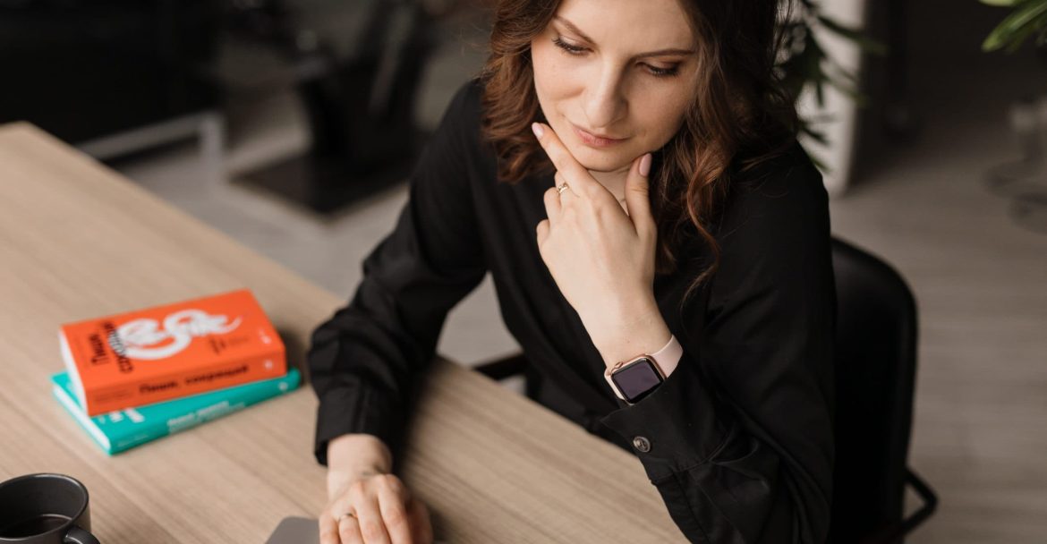 7 Pro Tips on How to Write Killer Commercial Scripts - woman types on her laptop