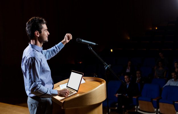 Characteristics of voice over — man giving a speech