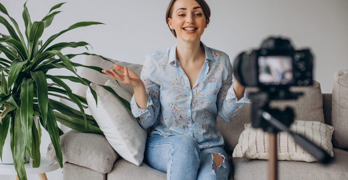 The Essential Guide to B2B Marketing Videos in 2025 - Young female blogger in front of camera