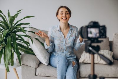 Why Your B2B Marketing Needs More Video in 2022 - Young female blogger in front of camera