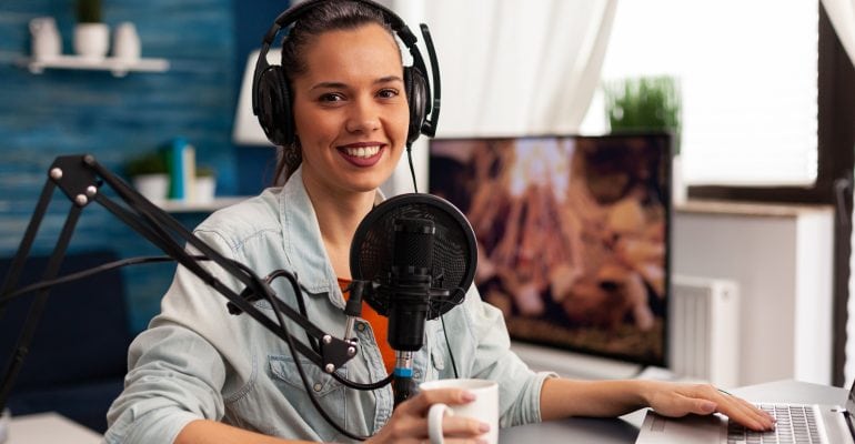 What Is SoniWhat Is Sonic Branding and How Can It Benefit Your Brand? Woman recording her voicec Branding and How Can It Benefit Your Brand? Woman recording her voice