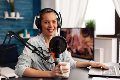 What Is SoniWhat Is Sonic Branding and How Can It Benefit Your Brand? Woman recording her voicec Branding and How Can It Benefit Your Brand? Woman recording her voice