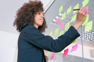 10 Best Project Management Apps for Creatives — woman managing projects